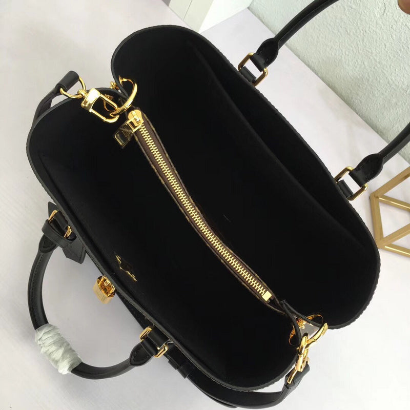 Front view of polished elevated women's handbag – women's luxury accessory