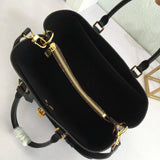 Front view of polished elevated women's handbag – women's luxury accessory