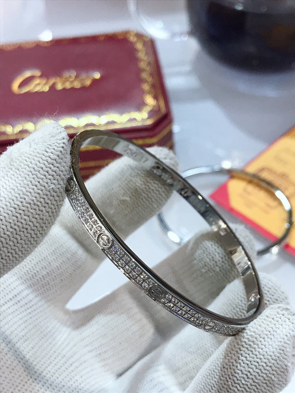 Front view of Cartier unisex jewelry piece