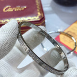 Front view of Cartier unisex jewelry piece