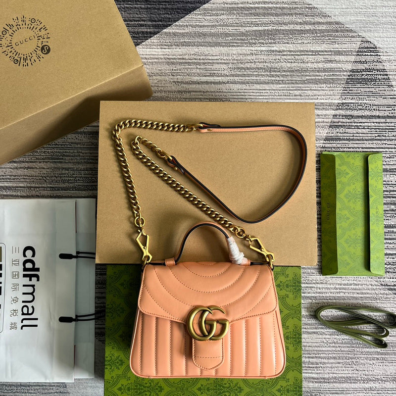 Side profile of chic refined women's handbag – women's statement bag