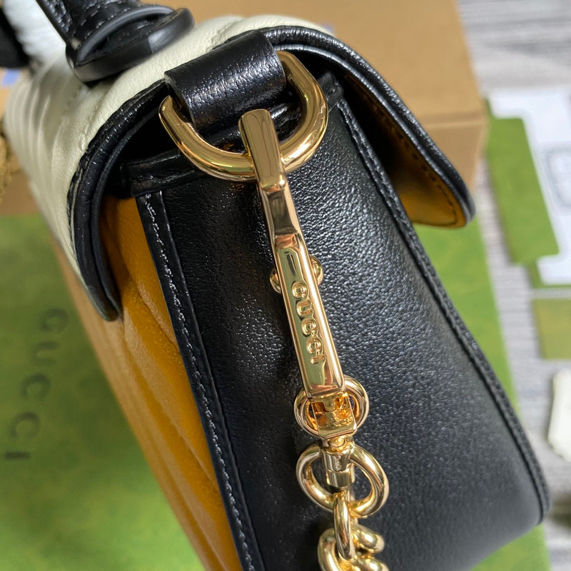 Interior view of polished classic women's handbag – women's statement bag