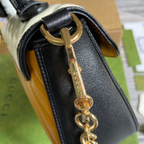 Interior view of polished classic women's handbag – women's statement bag