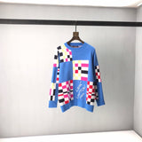 Front view of Louis Vuitton luxury clothing with logo-detail design