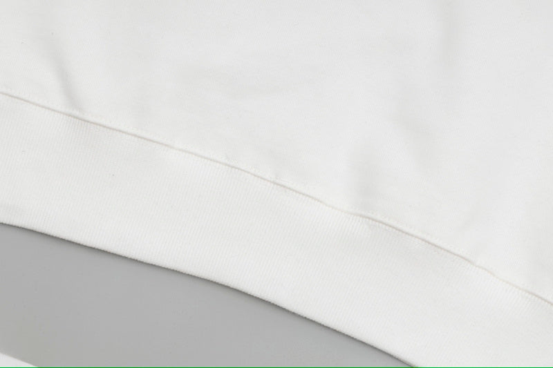Close-up detail shot of Louis Vuitton luxury clothing with signature branding