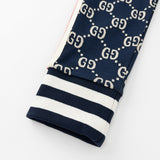 Full styled look of Gucci luxury clothing with logo-detail design