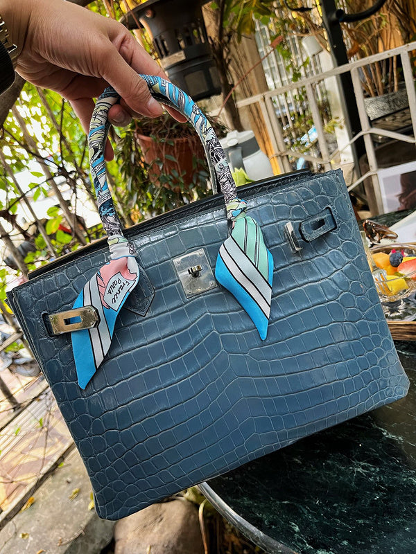 Side view of smart structured handbag