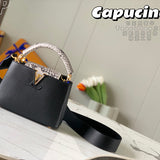 Side profile of statement structured women's handbag – women's statement bag