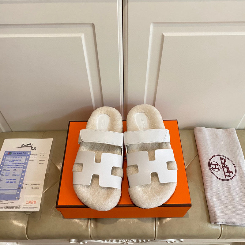Hermes sandals Style 093 - front view, iconic logo design