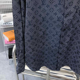 Back view of Louis Vuitton luxury clothing with label-forward styling