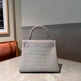 Side view of refined structured handbag