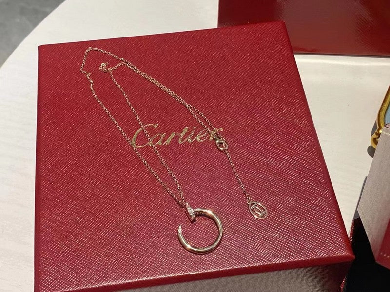 Angled view of Cartier unisex jewelry piece