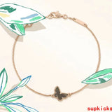 Lifestyle view of Van Cleef & Arpels unisex jewelry piece