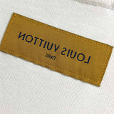 Side profile of Louis Vuitton luxury clothing with tailored silhouette