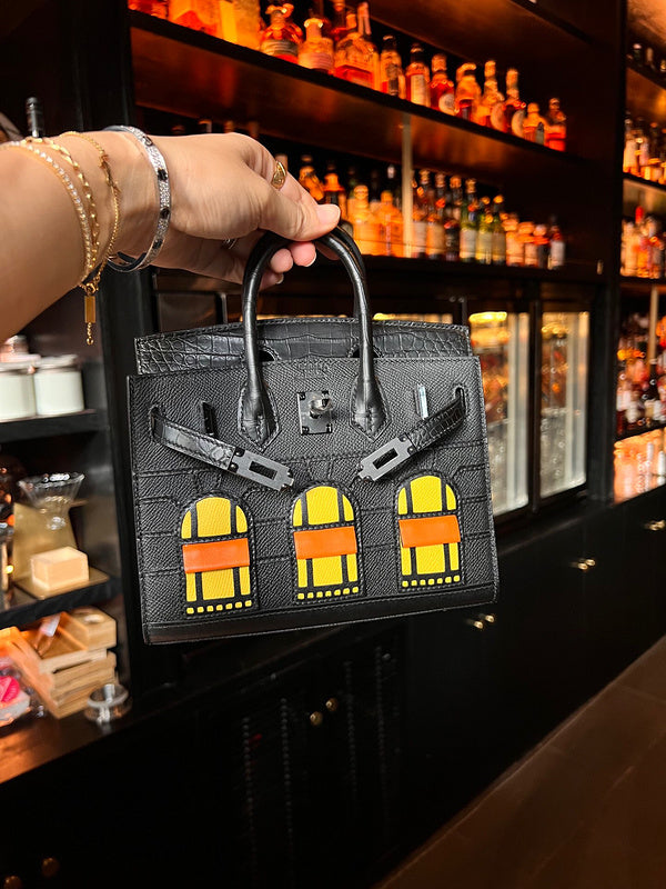 Close-up detail of understated bag design
