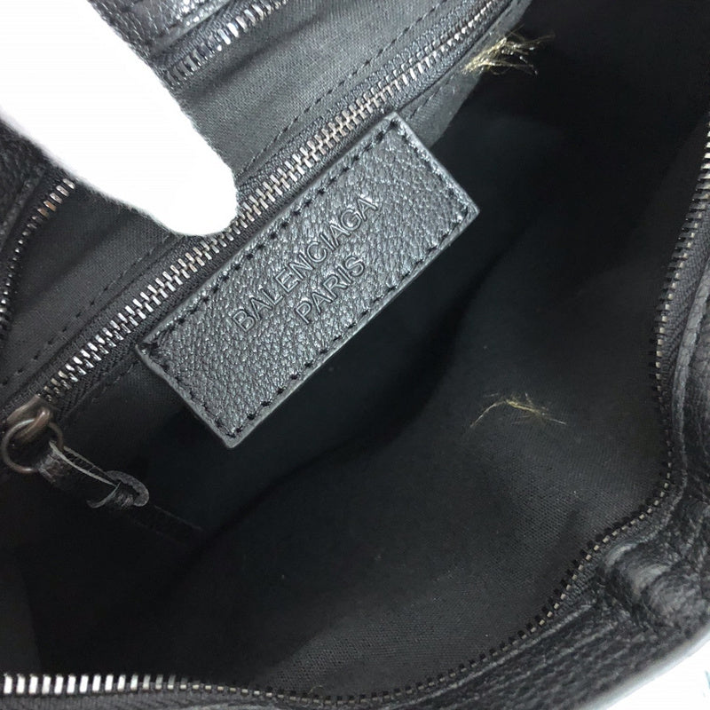 Close-up detail of structured polished women's handbag – women's luxury handbag