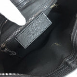Close-up detail of structured polished women's handbag – women's luxury handbag