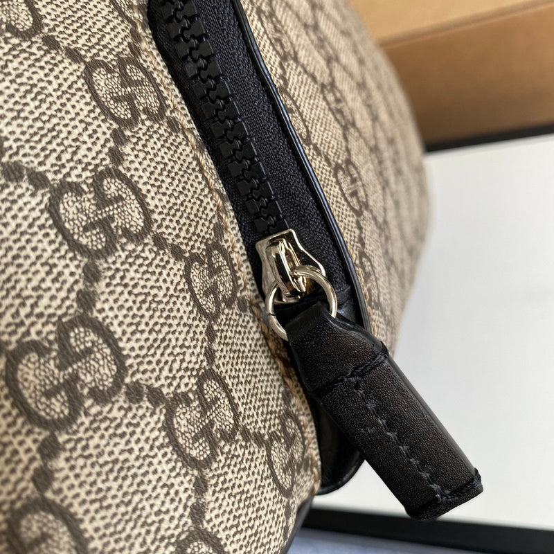 Handle and strap detail of structured polished women's handbag – women's statement bag