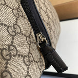 Handle and strap detail of structured polished women's handbag – women's statement bag
