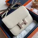 Side view of streamlined structured handbag