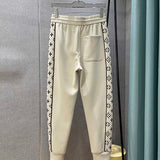 Back view of Louis Vuitton luxury clothing with tailored silhouette
