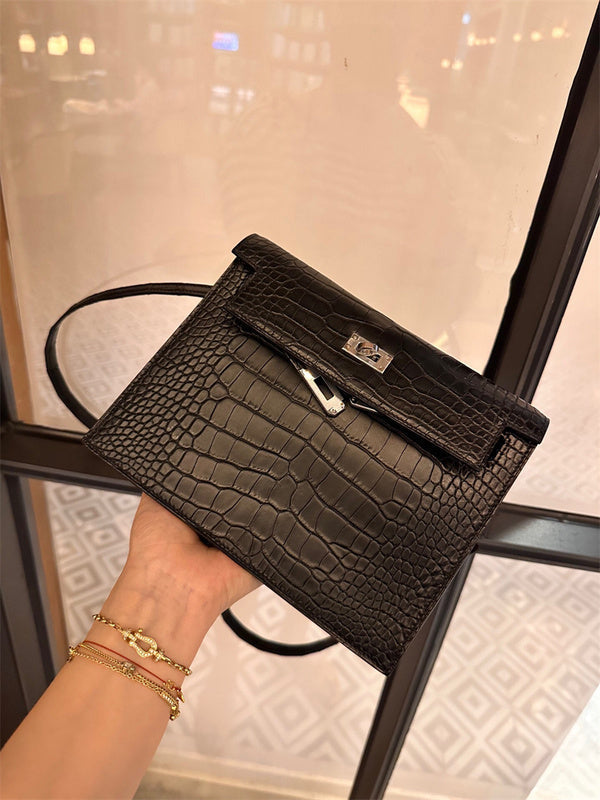 Side view of sleek structured handbag