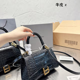 Ziva's Charm handbag – carry view (one versatile size)