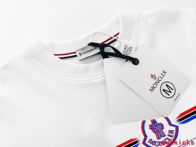 Side profile of Moncler luxury clothing with logo-detail design