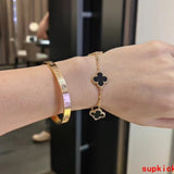 Side view of Van Cleef & Arpels unisex jewelry piece
