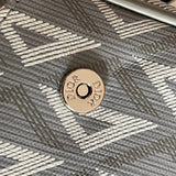 Top view of sleek polished women's handbag – women's luxury accessory