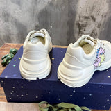 Gucci two-tone luxury sneakers view 6 signature lace-up style