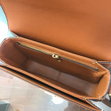 Close-up detail of signature elevated women's handbag – women's designer-style accessory