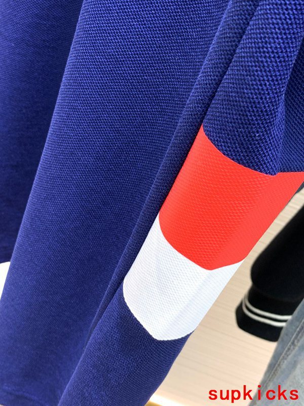 Side profile of Moncler luxury clothing with signature branding