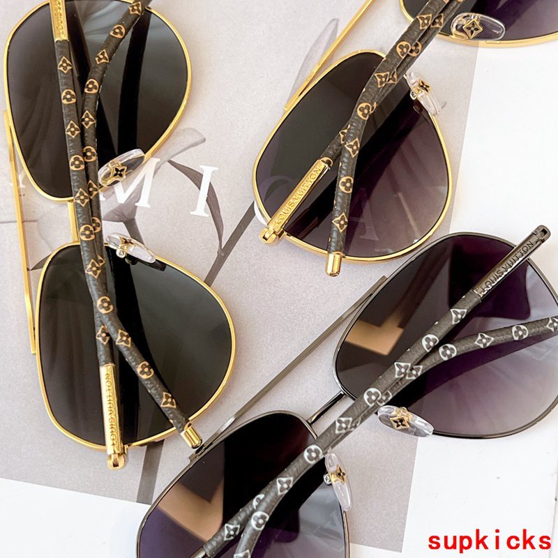 Close-up detail view of Louis Vuitton unisex sunglasses