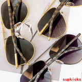 Close-up detail view of Louis Vuitton unisex sunglasses