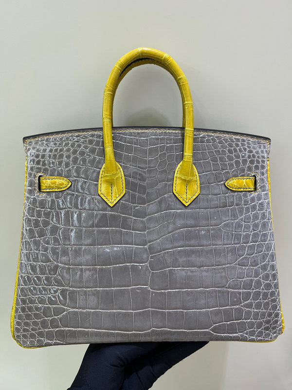 Side view of clean-lined structured handbag
