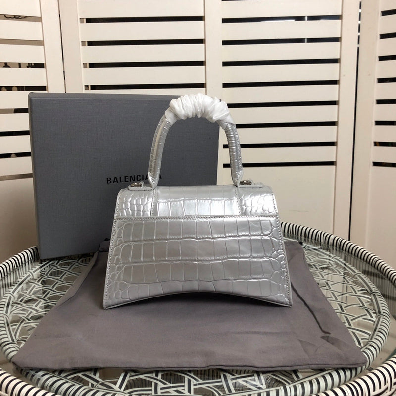 Styled lifestyle shot of premium signature women's handbag – women's statement bag