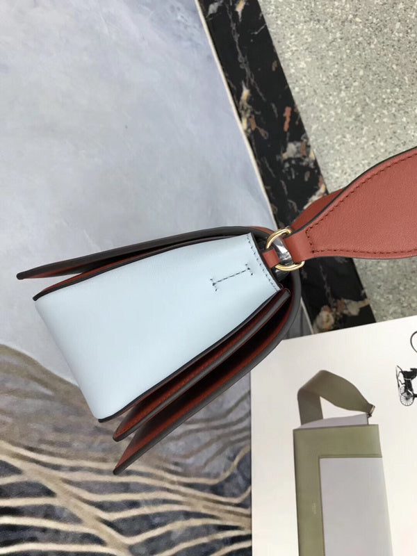 Styled lifestyle shot of refined polished women's handbag – women's premium purse