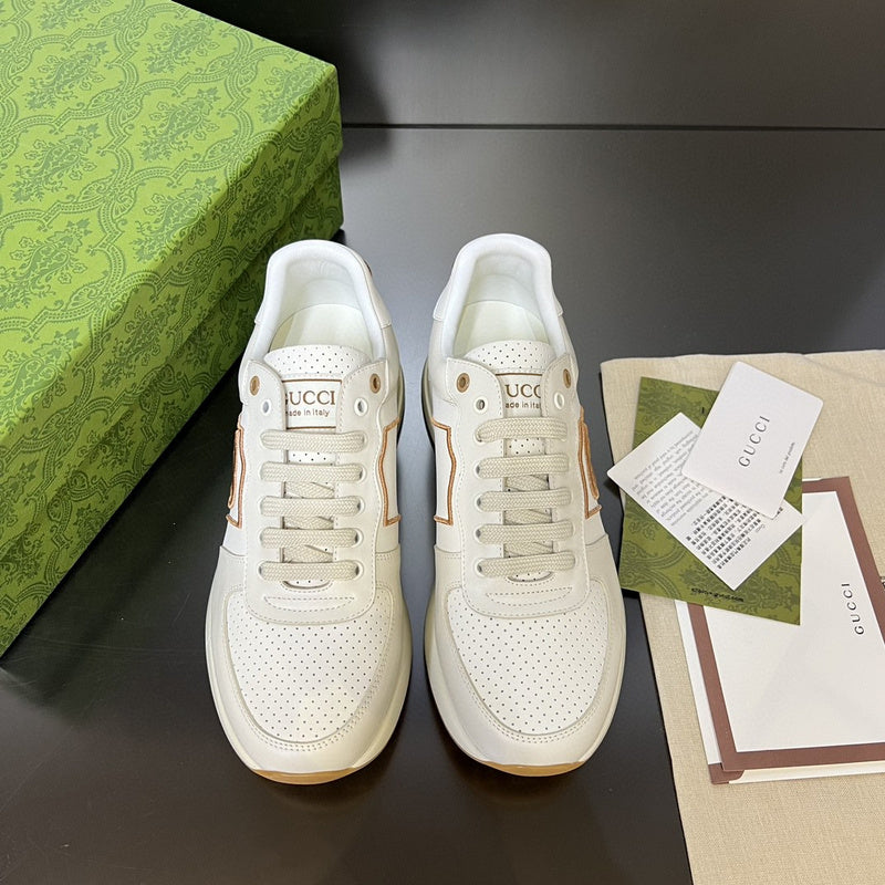 Gucci two-tone luxury sneakers view 11 signature lace-up style