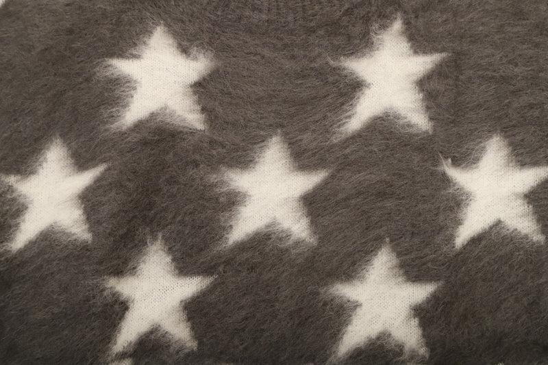 Flat lay presentation of Louis Vuitton luxury clothing with logo-detail design