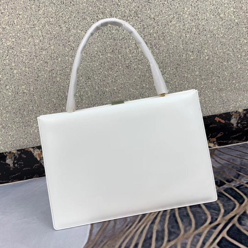 Back view of sleek classic women's handbag – women's luxury handbag