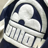 Side profile of Louis Vuitton luxury clothing with label-forward styling