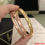 Front view of Van Cleef & Arpels unisex jewelry piece