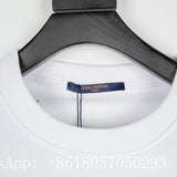 Front view of Louis Vuitton luxury clothing with label-forward styling