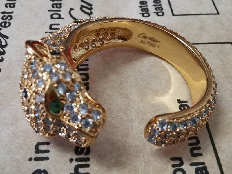 Front view of Cartier unisex jewelry piece