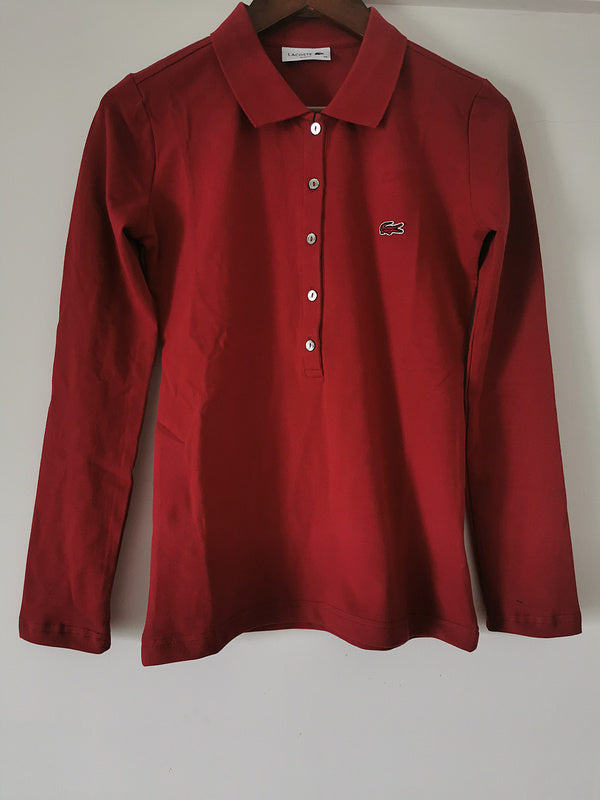 Close-up detail shot of Lacoste luxury clothing with logo-detail design