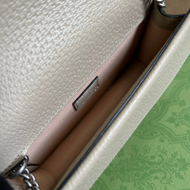Side profile of modern classic women's handbag – women's statement bag