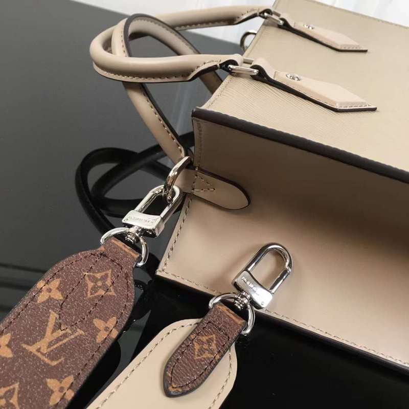 Handle and strap detail of statement structured women's handbag – women's everyday handbag