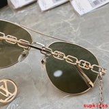 Close-up detail view of Louis Vuitton unisex sunglasses