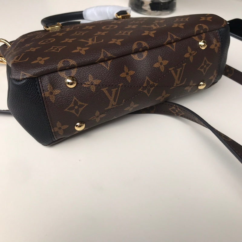 Styled lifestyle shot of everyday-luxe premium women's handbag – women's luxury handbag
